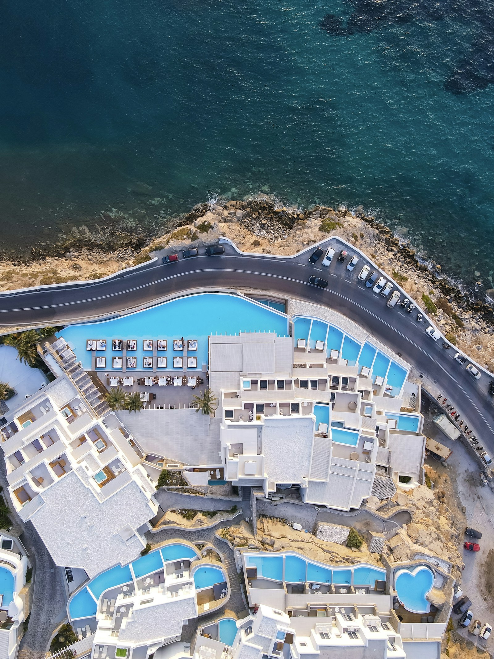 A small collection of whitewashed Mediterranean hospitality properties by the sea